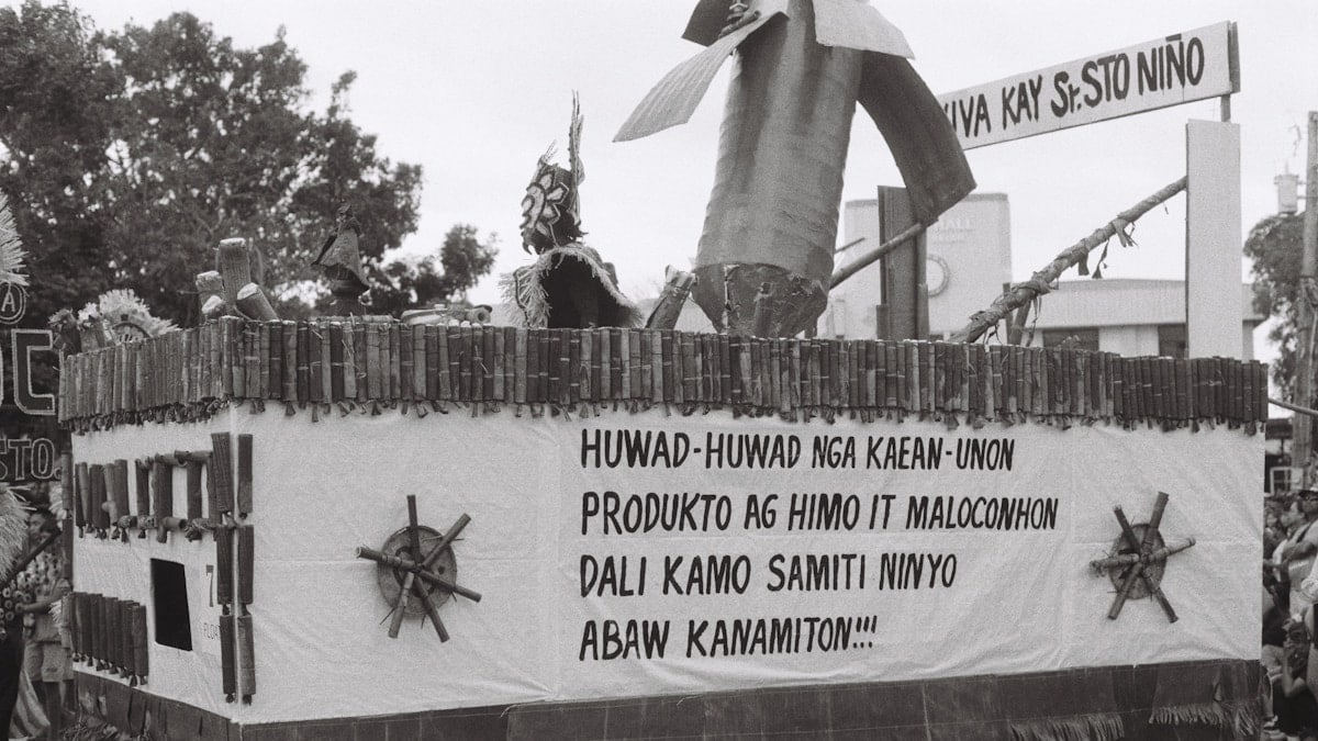 A parade float with a man on top of it